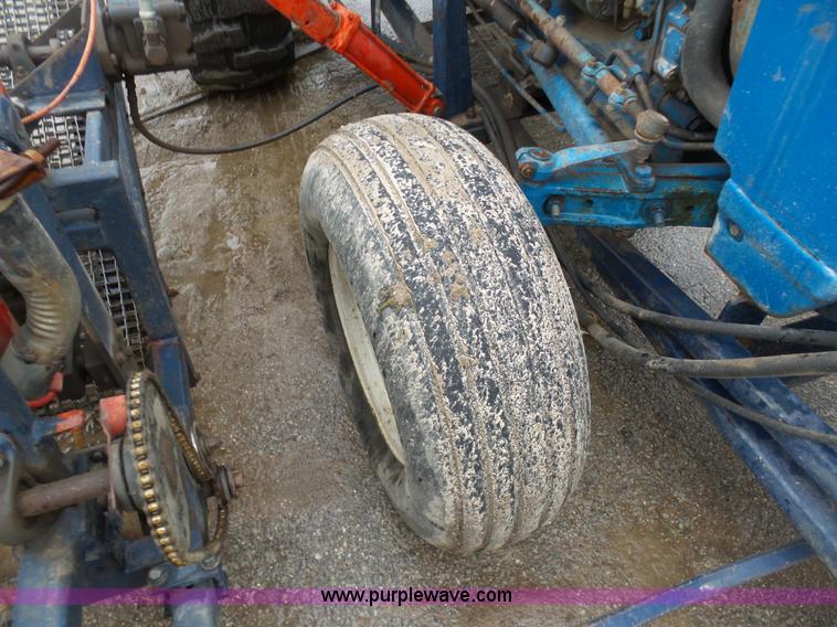 image for item K7665 Ford 3600 tractor with Brouwer sod harvester