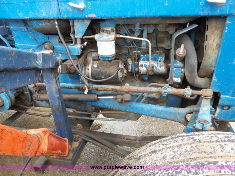 image for item K7665 Ford 3600 tractor with Brouwer sod harvester