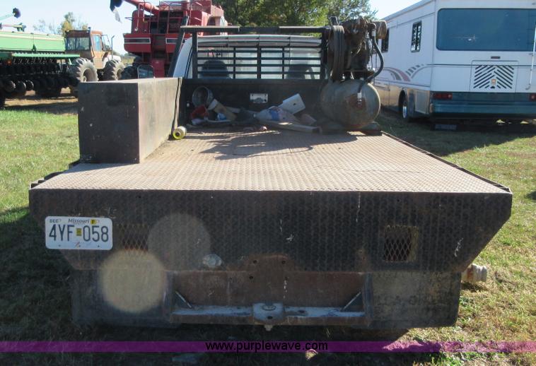 image for item BB9140 1989 Ford F350 flatbed pickup truck