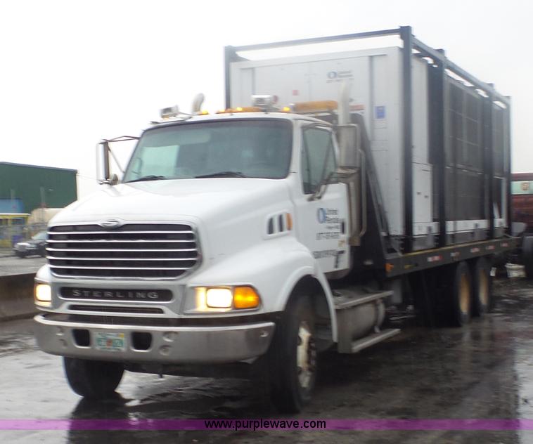 image for item F1075 2007 Sterling LT9500 rollback truck
