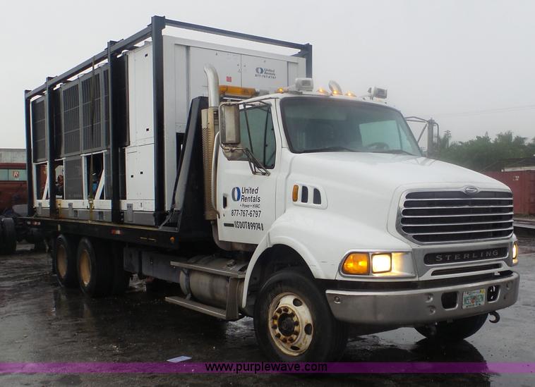 image for item F1075 2007 Sterling LT9500 rollback truck
