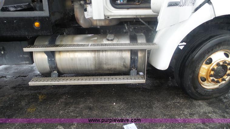 image for item F1075 2007 Sterling LT9500 rollback truck