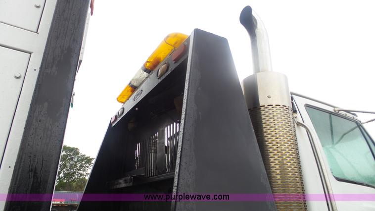 image for item F1075 2007 Sterling LT9500 rollback truck