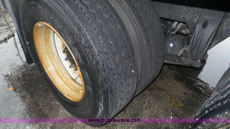 image for item F1075 2007 Sterling LT9500 rollback truck