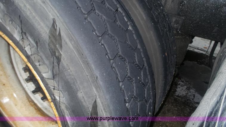 image for item F1075 2007 Sterling LT9500 rollback truck