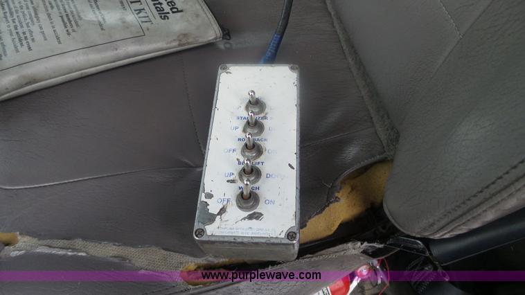 image for item F1075 2007 Sterling LT9500 rollback truck