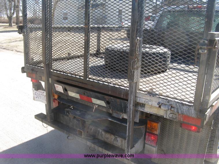 image for item J2943 2006 Chevrolet Silverado 2500HD flatbed pickup truck