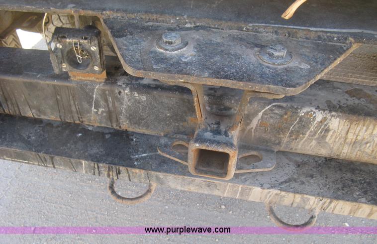 image for item J2943 2006 Chevrolet Silverado 2500HD flatbed pickup truck