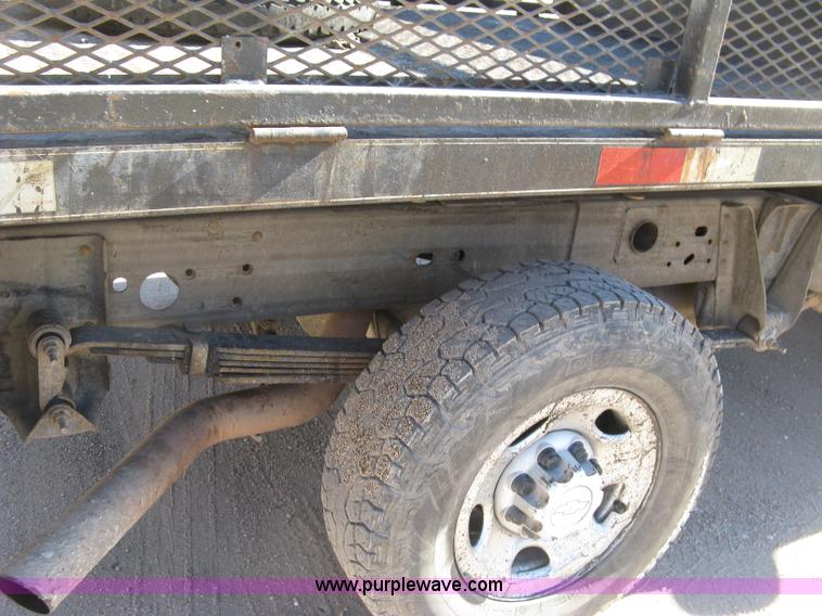 image for item J2943 2006 Chevrolet Silverado 2500HD flatbed pickup truck