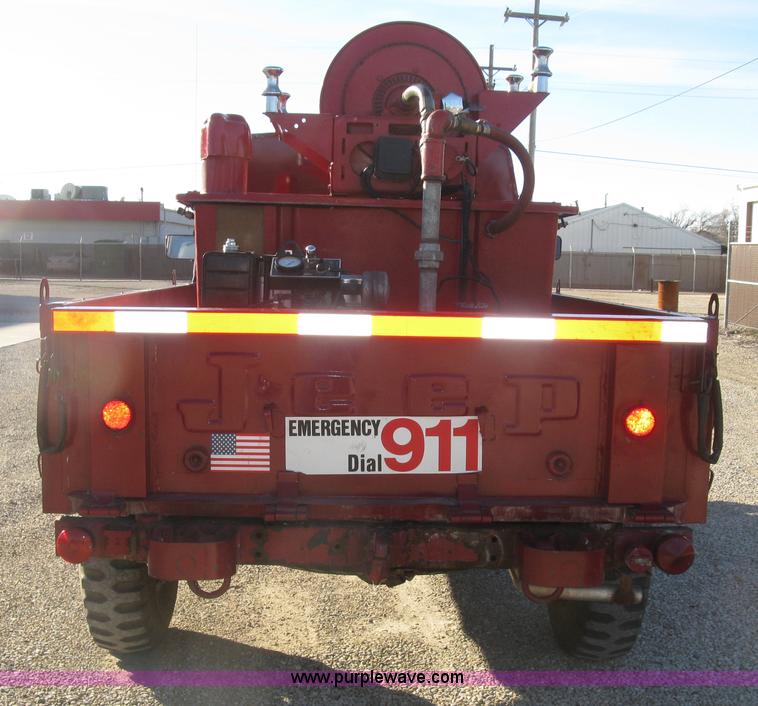 image for item J2962 1968 Kaiser Jeep M715 fire truck