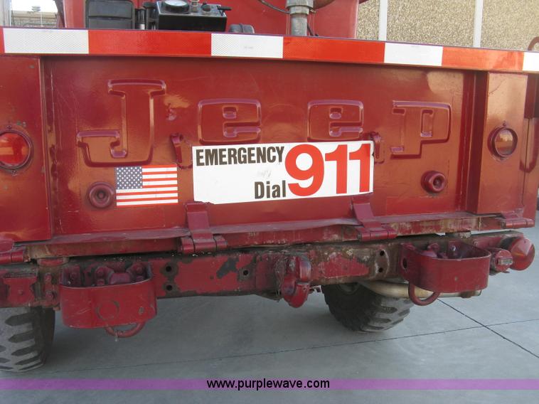 image for item J2962 1968 Kaiser Jeep M715 fire truck