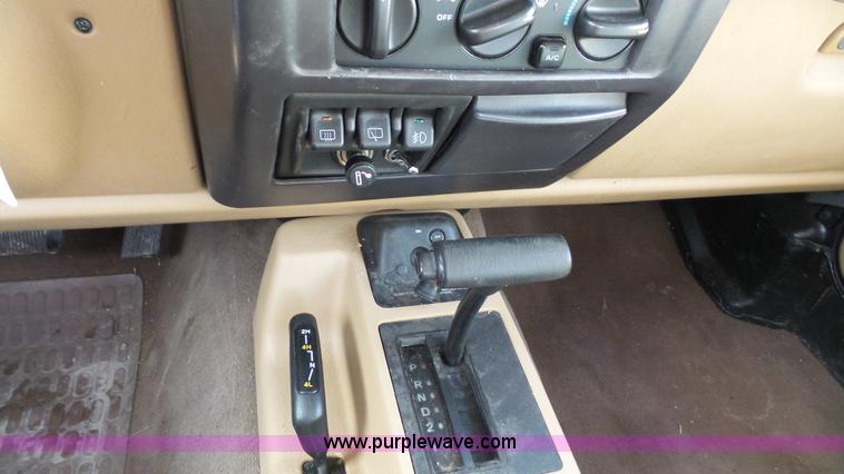 image for item J4516 1999 Jeep Wrangler Sahara SUV