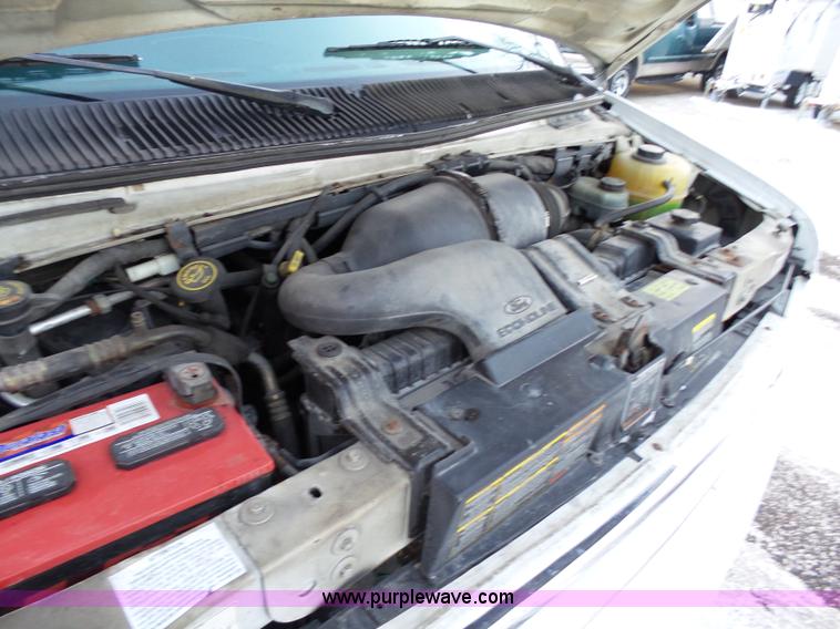 image for item J7377 1999 Ford Econoline E350 Super Duty Extended Tuscany Conversion van