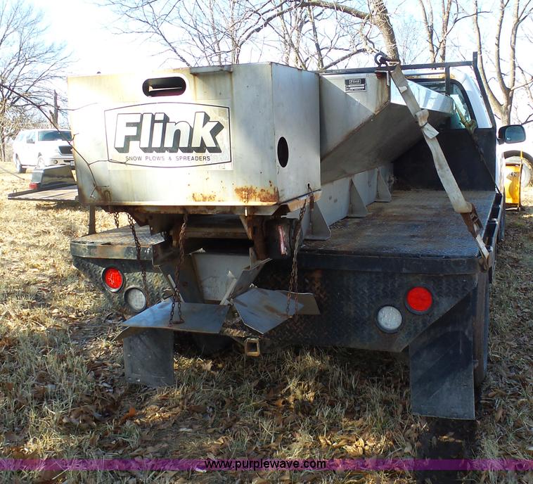 image for item K7609 2003 Ford F250 Super Duty SuperCab flatbed pickup truck