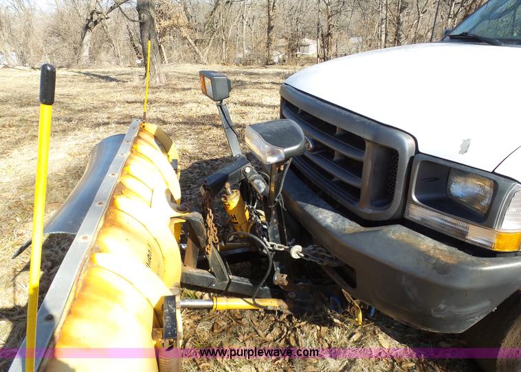 image for item K7609 2003 Ford F250 Super Duty SuperCab flatbed pickup truck