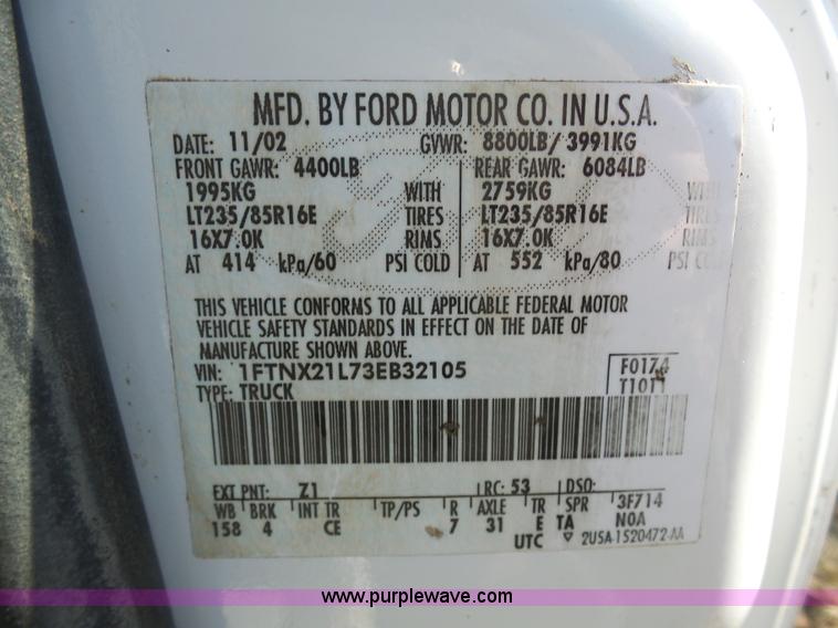 image for item K7609 2003 Ford F250 Super Duty SuperCab flatbed pickup truck