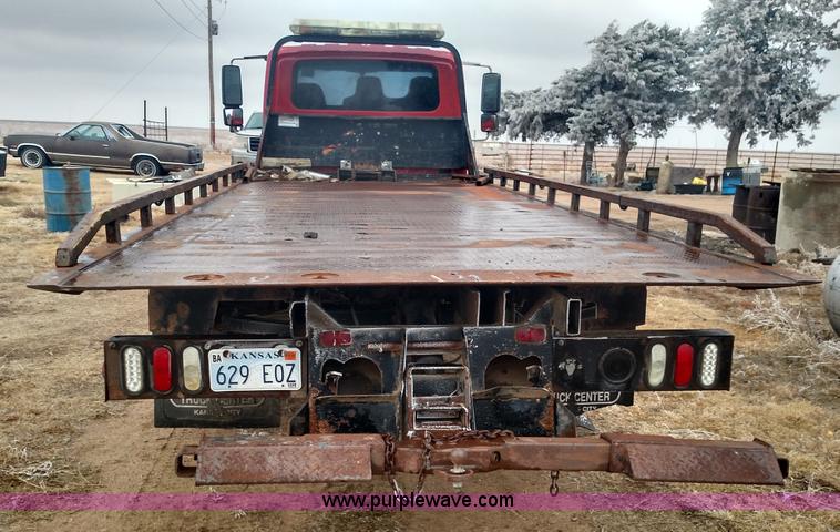 image for item L6112 2004 International DuraStar 4300 rollback truck