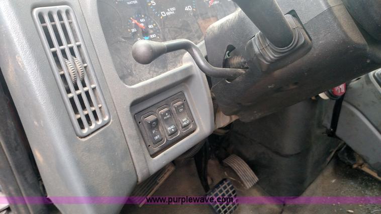 image for item L6112 2004 International DuraStar 4300 rollback truck