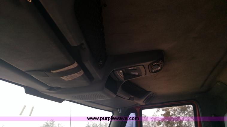 image for item L6112 2004 International DuraStar 4300 rollback truck