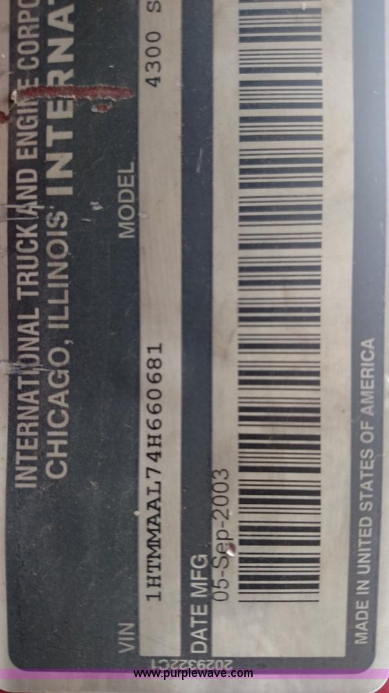 image for item L6112 2004 International DuraStar 4300 rollback truck