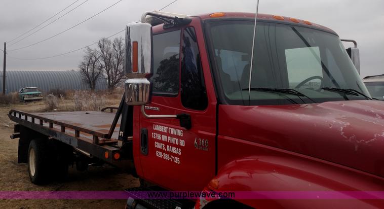 image for item L6112 2004 International DuraStar 4300 rollback truck