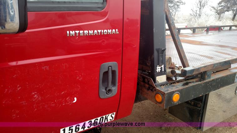 image for item L6112 2004 International DuraStar 4300 rollback truck