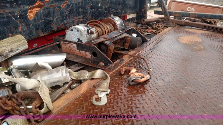 image for item L6112 2004 International DuraStar 4300 rollback truck