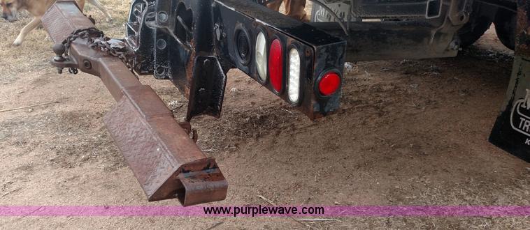 image for item L6112 2004 International DuraStar 4300 rollback truck