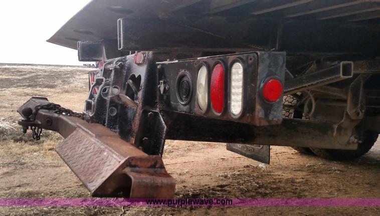 image for item L6112 2004 International DuraStar 4300 rollback truck