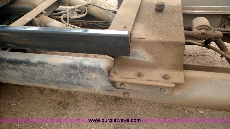 image for item L6112 2004 International DuraStar 4300 rollback truck