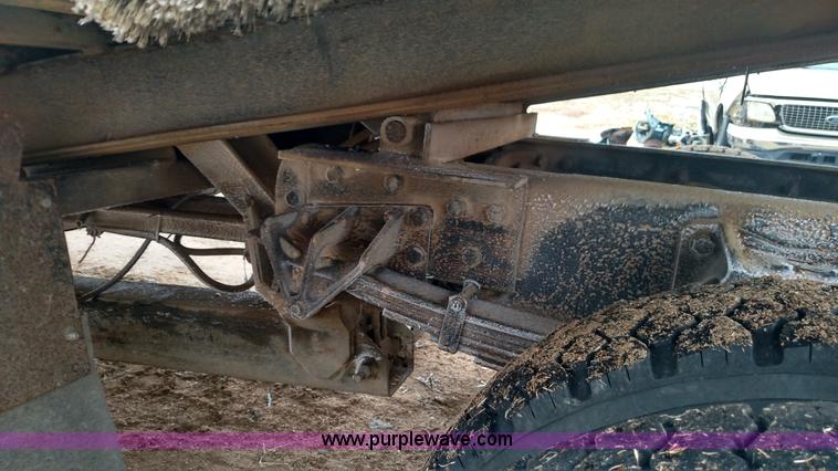 image for item L6112 2004 International DuraStar 4300 rollback truck