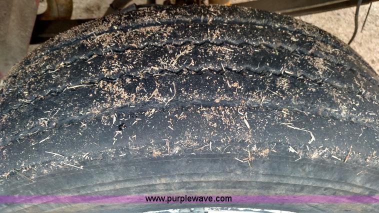 image for item L6112 2004 International DuraStar 4300 rollback truck