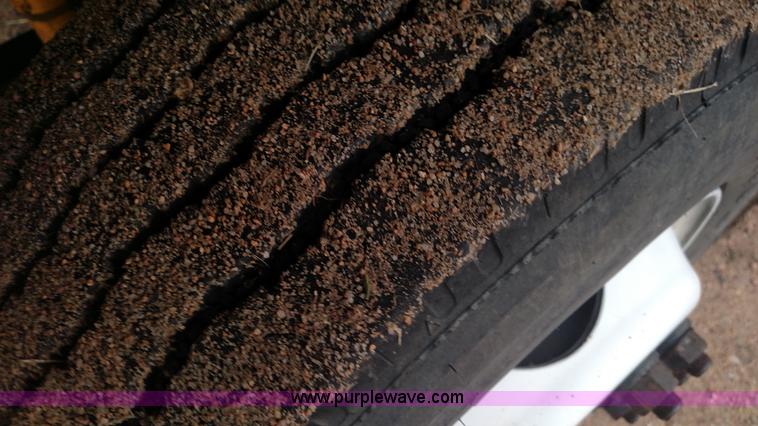 image for item L6112 2004 International DuraStar 4300 rollback truck