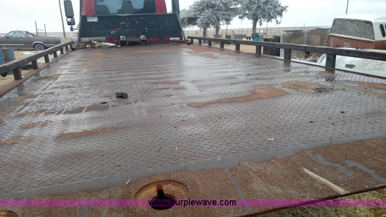 image for item L6112 2004 International DuraStar 4300 rollback truck