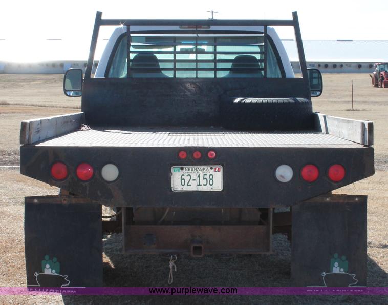 image for item L6786 2002 Ford F350 Super Duty XLT flatbed pickup truck