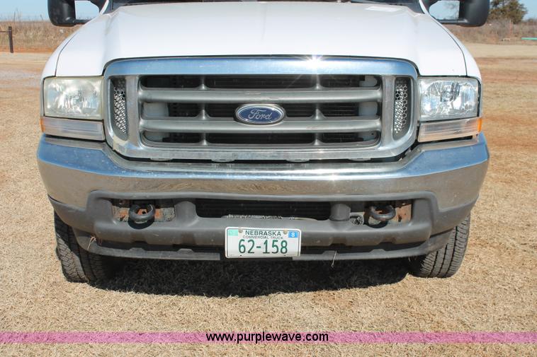 image for item L6786 2002 Ford F350 Super Duty XLT flatbed pickup truck