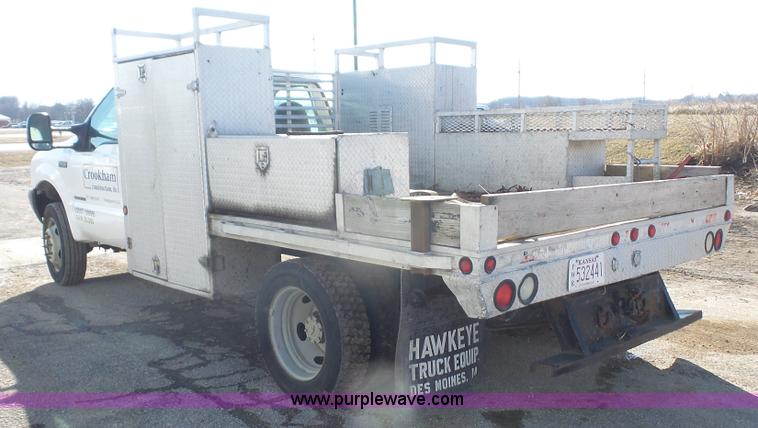 image for item J4633 2001 Ford F450 Super Duty flatbed pickup truck