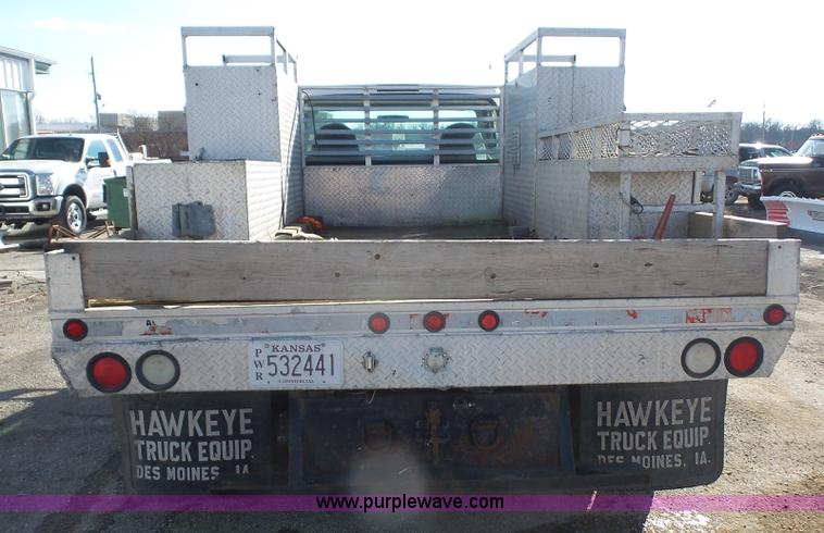 image for item J4633 2001 Ford F450 Super Duty flatbed pickup truck