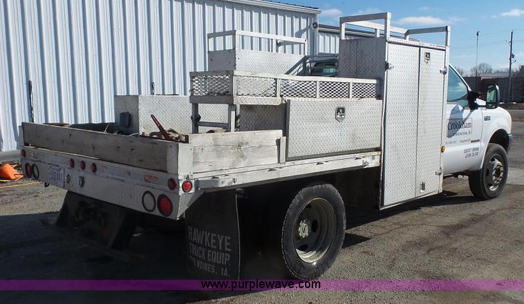 image for item J4633 2001 Ford F450 Super Duty flatbed pickup truck