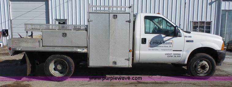 image for item J4633 2001 Ford F450 Super Duty flatbed pickup truck