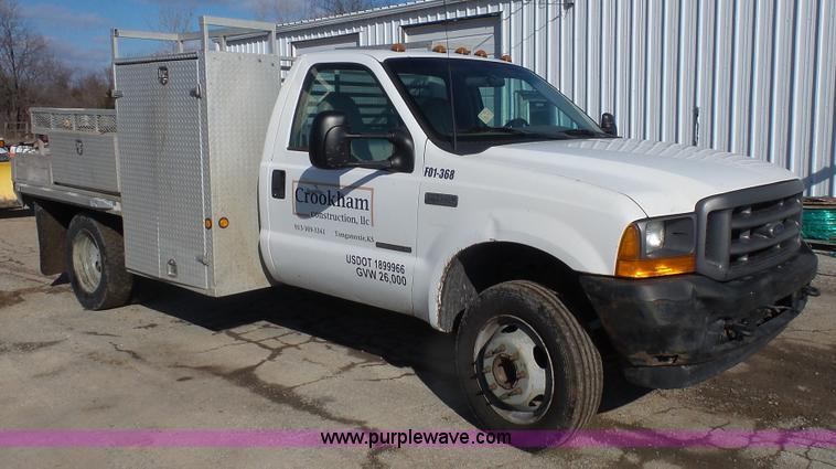 image for item J4633 2001 Ford F450 Super Duty flatbed pickup truck
