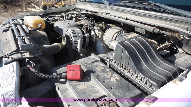 image for item J4633 2001 Ford F450 Super Duty flatbed pickup truck