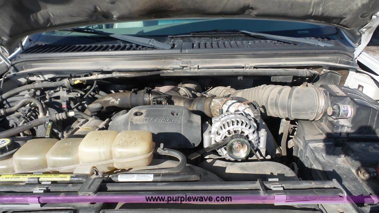 image for item J4633 2001 Ford F450 Super Duty flatbed pickup truck