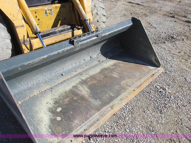 image for item L7098 1997 John Deere 8875 skid steer