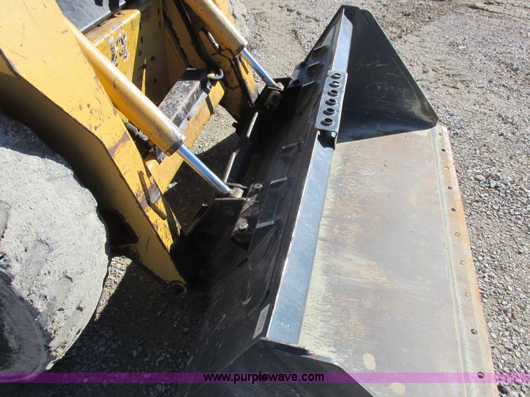image for item L7098 1997 John Deere 8875 skid steer