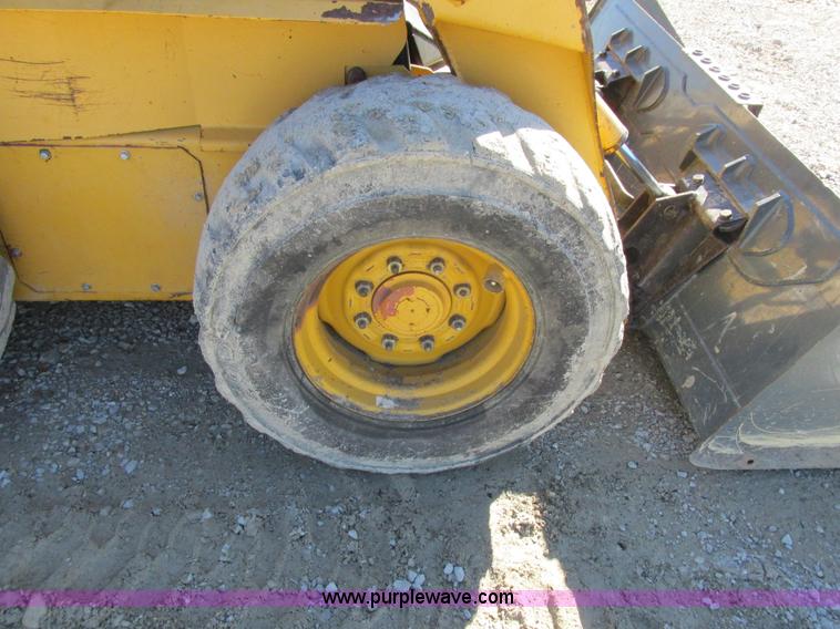 image for item L7098 1997 John Deere 8875 skid steer