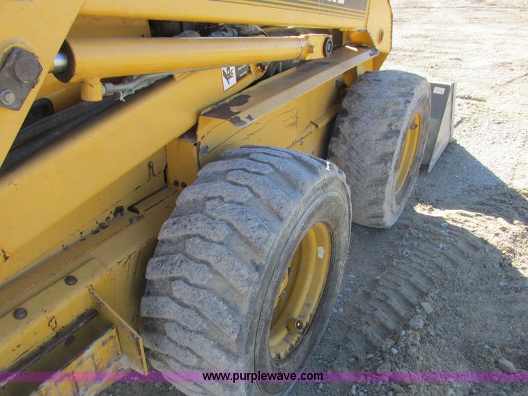 image for item L7098 1997 John Deere 8875 skid steer