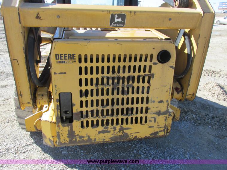 image for item L7098 1997 John Deere 8875 skid steer