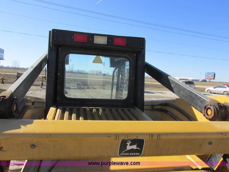 image for item L7098 1997 John Deere 8875 skid steer