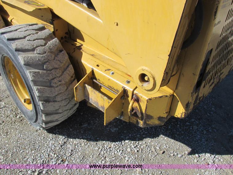 image for item L7098 1997 John Deere 8875 skid steer